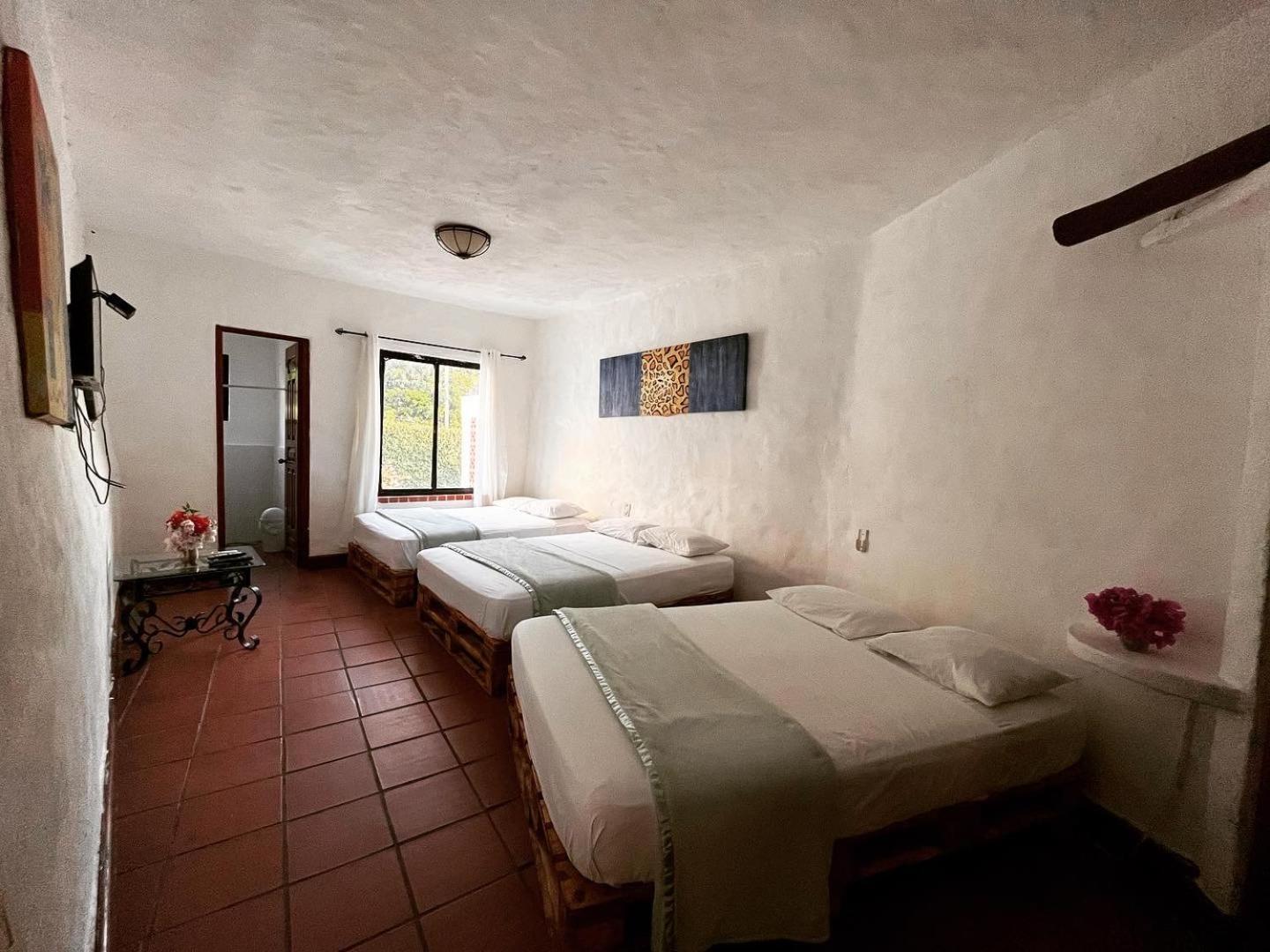 Mia Nueva Gorgona Hotel Værelse billede